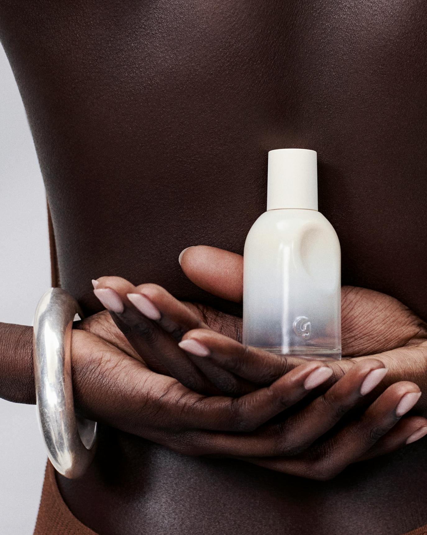 doux bottle in hand